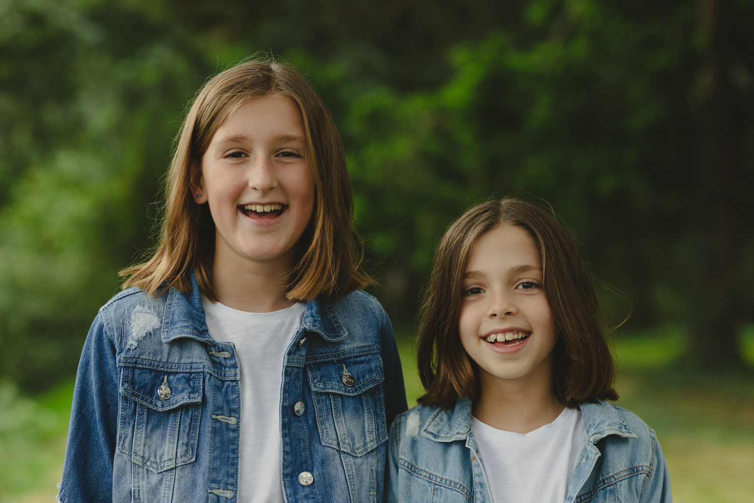 Happy newly wed couple outside Oxford Bodleian Library. Alternative confetti shot.