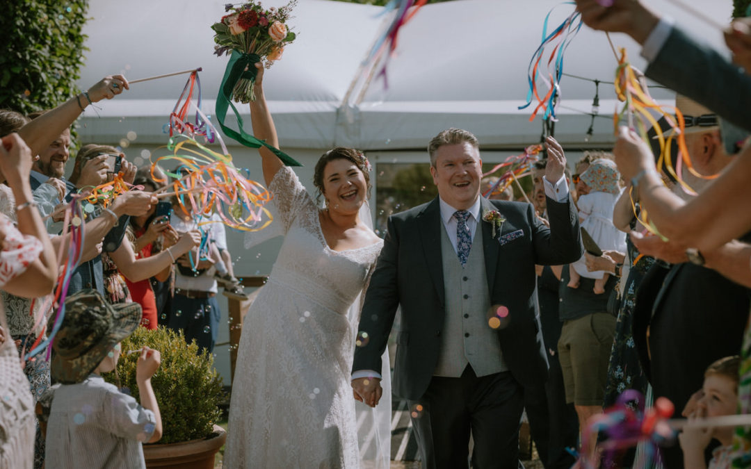 Mill House Hotel Swallowfield Wedding Bride and Groom walking and looking happy