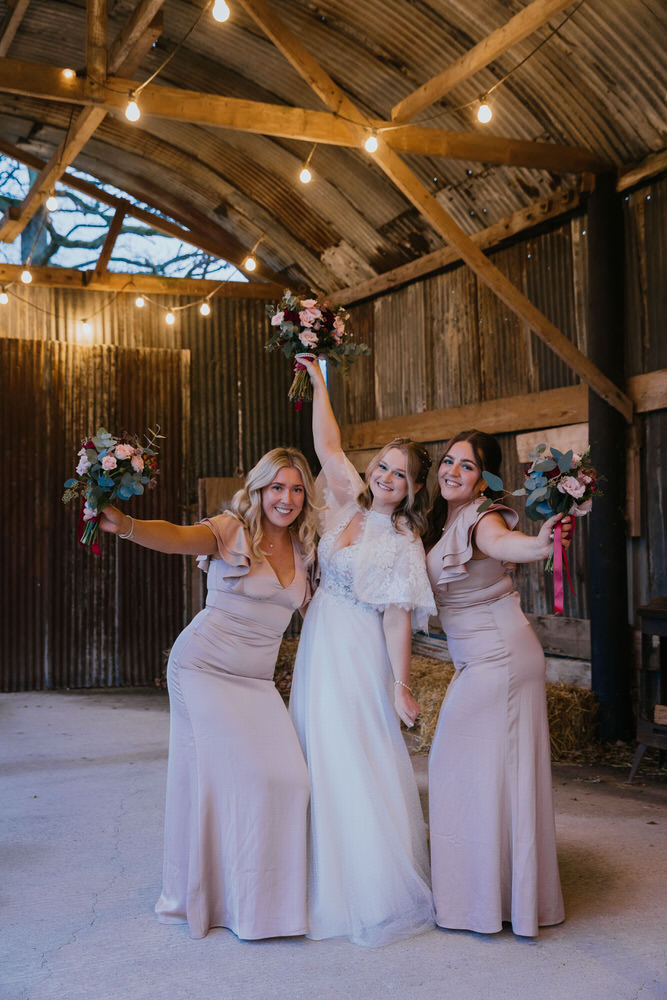 Bride and Groom Kissing in an archway At Elcot Park Retreat Hotel and Spa<br />
