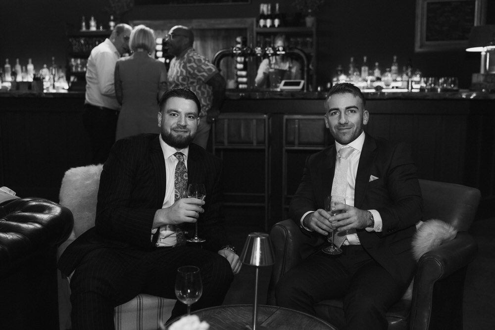 Bride and Groom Kissing in an archway At Elcot Park Retreat Hotel and Spa